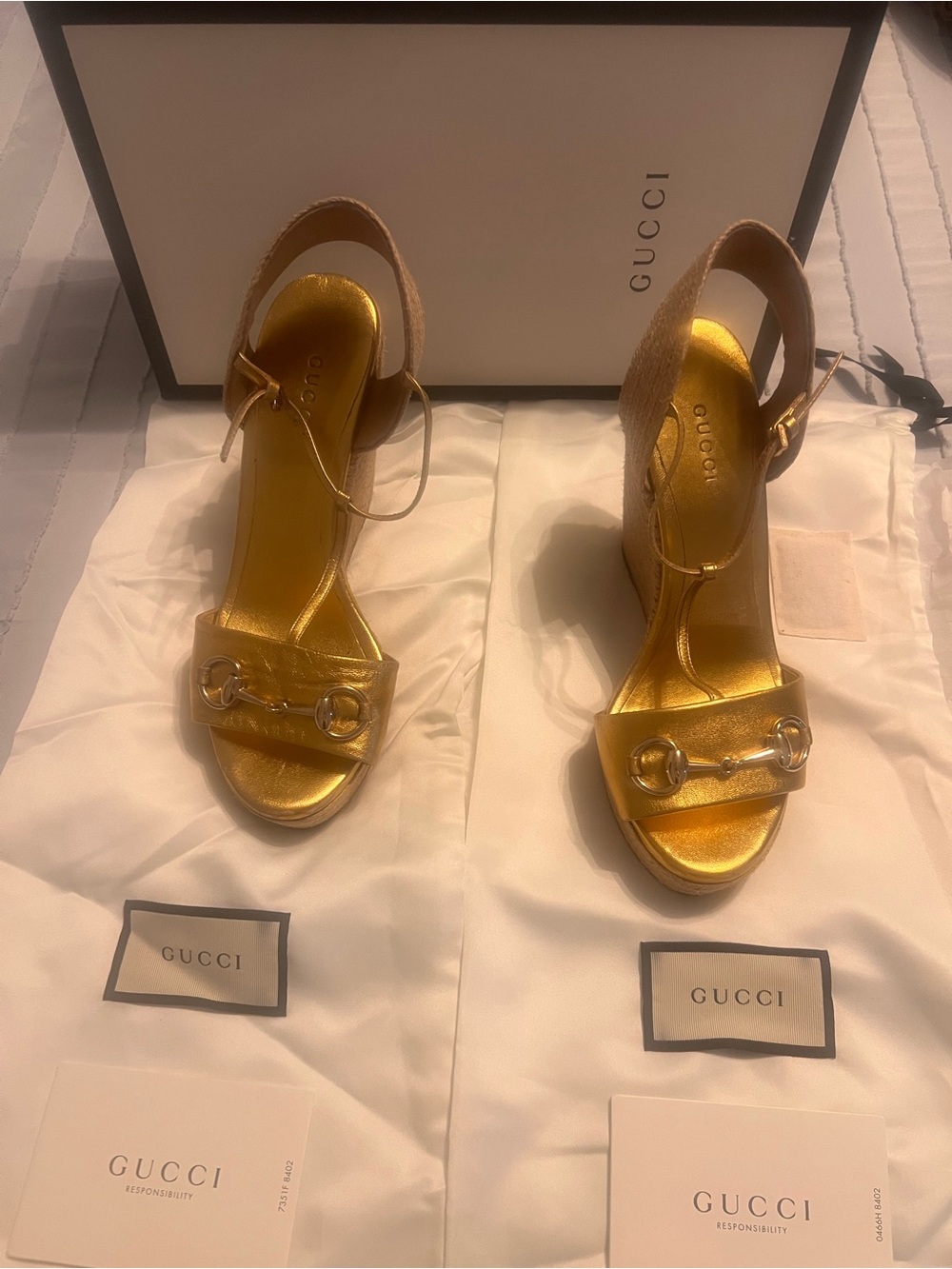 Gucci authentic Gold Wedge Sandals